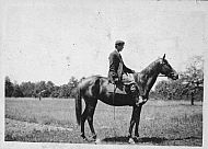 Man Riding a Horse