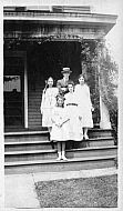 Four Young Girls and Man on Porch