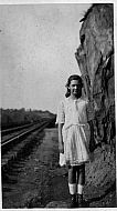 Girl on Railroad Tracks