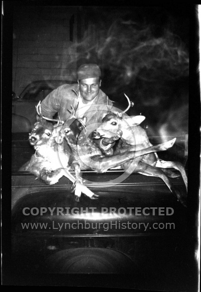  : Earl Woody  - Picture of man and dead deer