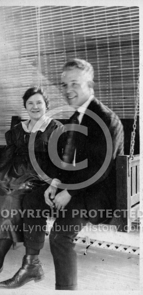 Couple Sitting in Porch Swing