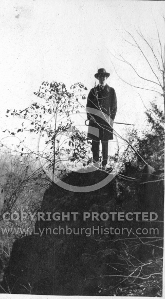 Man on a Rock With Cane